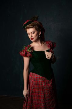 Scottish esthetics inspired Victorian period dress. Suitable as an evening gown or a ball gown for 1880s events, will look great for natural form or bustle era dresscode. The dress consists of the velvet bodice, decorated with tartan fabric and artificial plants, and the skirt with plaid fabric band, which represents an element of Scottish national costume. The plaid fabric is to be chosen, please PM for the options, as the one shown may be not available in the moment. Please note that the headp Tartan Ball Gown, Red Victorian Dress With Historical Design, Red Victorian Dress Costume, Red Victorian Dress For Costume, Red Vintage Victorian Dress With Fitted Bodice, Tartan Gown, Christmas Ballgown, Gothic Ballgown, 1890s Dress