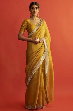 Editor's Note This set features a mustard yellow embroidered tusser silk saree with tusser silk blouse. Color: Yellow Fabric: Tusser Silk Care: Dry Clean Only About the Designer Saksham & Neharicka make modernizing Indian wear with rich handwoven textiles, fresh intricate textures, chic and classic silhouettes, Saksham & Neharicka handcraft all designs to eternal perfection. Their soulful stories are inspired by nature, mythology, and popular culture. Yellow Blouse Designs, Modern Saree, Set Saree, Silk Saree Blouse Designs, Green Saree, Blue Saree, Tussar Silk Saree, Stylish Sarees