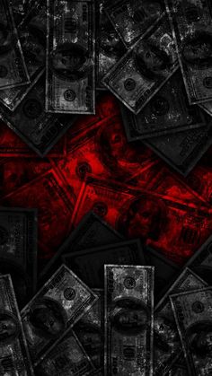 a bunch of money that is laying on top of each other in the middle of a red and black background