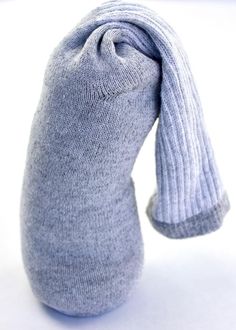 a gray sock with a blue tie on it