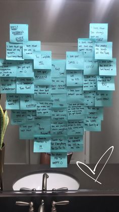 sticky notes are attached to the wall in front of a bathroom sink with a faucet