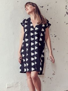 Easy breezy tunic dress with pockets (see image of navy ikat) v neck and a wide versatile cut shape. black u0026 cream ikat 100% cotton weave made fair trade and with minimal waste in india. i'm quarantine modeling here - 5.3 u0026 am wearing a size small the sizes run big. 3 Am, Easy Breezy, Dress With Pockets, Black Love, Black Cream, Tunic Dress, Cotton Weaving, Fair Trade, Tshirt Dress