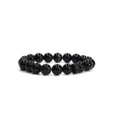 Discover the timeless beauty of the Noire Stone Bracelet. Crafted with the utmost precision, the smooth and stunning black tiger eye stone beads form an alluring combination that effortlessly enhances any ensemble. The addition of the matte black logo bead adds a touch of boldness and an effortlessly cool look. - 10mm black tiger eye stone beads- Black plated eLiasz and eLLa logo bead- Bracelet is stretchable, stackable and made with natural, cut & conditioned stones- Signature jewelry pouch inc Black Adjustable Stretch Bracelet With Gemstone Beads, Casual Black Stretch Bracelet With Gemstone Beads, Adjustable Black Wristband With Gemstone Beads, Modern Black Bracelet With 8mm Beads, Modern Black Bracelets With 8mm Beads, Minimalist Onyx Beaded Bracelets With Round Beads, Minimalist Onyx Beaded Bracelet With Round Beads, Adjustable Black Obsidian Beaded Bracelets, Minimalist Onyx Beaded Bracelet