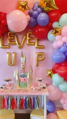 a birthday party with balloons and decorations