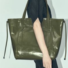 New With Tags Zara Large Leather Tote Bag.Side Tie Detail.Front Pockets.Shoulder Straps.Interior Pockets. Elegant Green Bucket Bag With Large Capacity, Chic Green Leather Bucket Bag, Elegant Green Large Capacity Bucket Bag, Zara Shoulder Bag With Removable Pouch For Travel, Zara Leather Satchel With Adjustable Strap, Chic Green Shoulder Bag With Leather Handles, Elegant Green Shoulder Bag For Errands, Zara Tote Bag With Leather Handles, Olive Tote Bag For Shopping