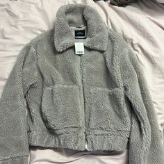 Nwt Teddy Jacket From Uo; The Color Is A Bit More Tan Than Grey Gray Winter Fleece Jacket For Streetwear, Casual Urban Outfitters Outerwear For Cold Weather, Gray Fleece Jacket For Streetwear, Urban Outfitters Long Sleeve Outerwear For Cold Weather, Urban Outfitters Casual Long Sleeve Outerwear, Fuzzy Jacket Outfit, Urban Outfitters Winter, Fuzzy Teddy Bear Jacket, Fuzzy Brown Jacket