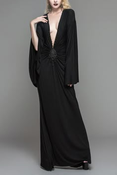 Product Code: SKT040 Color: Black Gender: Female Materials: POLYESTER95% SPANDEX5% Notice: Other Accessories Are Not Include The whole dress is made of 40 Modal fabric and is designed into a long-sleeved dress with deep V neck and bat sleeves. The neckline has a rose button, which can adjust the height and size of the neckline by yourself. The waist is decorated with a frog button. Size (IN) Bust Waist Height Hip M 33.07-38.98 24.41-30.31 64.17-68.50 33.86-39.76 2XL 38.98-44.88 30.31-36.22 66.54-70.08 39.76-45.67 4XL 44.88-46.85 36.22-38.19 68.90-72.44 45.67-47.64 Size (CM) Bust Waist Height Hip M 84-99 62-77 163-174 86-101 2XL 99-114 77-92 169-178 101-116 4XL 114-119 92-97 175-184 116-121 Bat Sleeves Dress, Twenties Style, Black Frog, Rock Style Outfits, Deep V Neck Dress, Bat Sleeve, High Waist Dress, Statement Dress, Black Everything