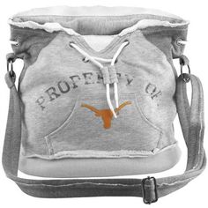 the texas longhorns logo is shown on this white purse, which has an orange and