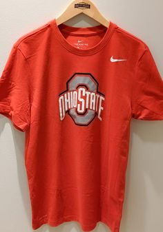 Nike Ohio State Buckeyes Red Big Logo Dri-FIT Short Sleeve T Shirt - 19861498 Ohio State T Shirt, Orange Team Spirit Tops For Sports Events, Orange Tops For Sports Events With Team Spirit, Sporty Orange Tops For Fan Gear, Orange Team Spirit Sports Top, Team-colored Fan Apparel Shirt With Team Logo, Casual Fan Gear T-shirt For Sports Season, Collegiate Short Sleeve Fan Gear Shirt, Orange Short Sleeve Team Spirit Top