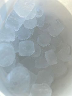 small chunks of ice in a white bowl