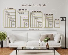 the wall art size guide is displayed in front of a white couch and coffee table