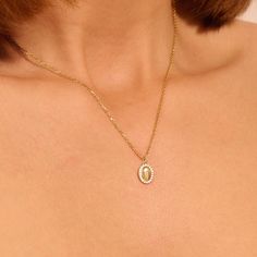 Elevate your style with this Oval Signet Gold Pendant, a symbol of timeless elegance. Crafted from 14k Solid Gold, this necklace features a minimalist initial engravable charm, allowing you to personalize it with your own unique touch. Pendant Details ❥ Gold KT: 10k 14k 18k Solid Gold ❥ Gold Colour Options; Yellow Gold, White Gold, Rose Gold ❥ Pendant: 11.50x7.90 mm ❥ Pendant Thickness: 1.75 mm ❥ Gemstone: AAA Grade White Cubic Zirconia ❥ Ready to Ship in 4-7 Business Days MORE FROM US Pendant and Necklaces: https://etsy.me/3NgqiKb More about my shop: https://etsy.me/3mwMnsA ESSENTIAL INFORMATION 💎 BRENNMORE pieces are handcrafted by 15-30 years of experienced craftsmen and made to order. 🎁 All pieces come in a special turquoise gift box wrapped beautifully with a ribbon 🌎 All of our ma Dainty Pendant, Rose Gold Pendant, Yellow Gold Pendants, Oval Pendant, Small Pendant, Gold Pendant Necklace, Handmade Pendants, Yellow White, Gold Pendant