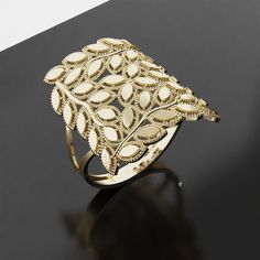 Indulge in elegance with our collection of elegant gold bead leaf rings. Crafted with finesse and adorned with shimmering gold beads, these rings are a testament to sophistication and true gold preferences. Their lightweight design and captivating leaf-inspired beauty make them a refined choice As Gohle Jewelry, I am excited to share special design rings with you Material:10K Gold, 14K Gold *Every item is made from scratch, solid gold and made to order with attention to every detail *I highly recommend going to a jeweler to get you ring sized using the the width sizing band you want to order to size your hand. If you order the wrong size it can be exchanged for the correct size but its always better to get it right the first time *It will be your responsibility to ship your ring back to us 14k Yellow Gold Leaf-shaped Jewelry, Elegant Leaf-shaped Wedding Jewelry, Yellow Gold Leaf-shaped Formal Jewelry, Elegant Leaf-shaped Jewelry For Formal Occasions, Formal Yellow Gold Leaf-shaped Jewelry, Elegant Leaf-shaped Formal Jewelry, Elegant Leaf-shaped Anniversary Rings, Formal Yellow Gold Leaf Jewelry, Gold Filigree Open Ring Jewelry