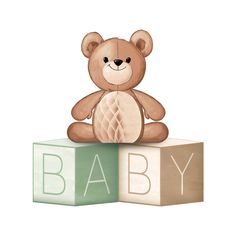 a brown teddy bear sitting on top of blocks with the word baby spelled in it