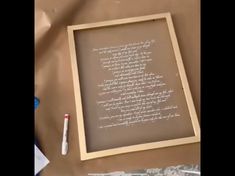 an old handwriting is on display in a frame