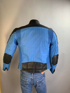 Vintage 90s leather and coated nylon Hein Gericke motorcycle jacket in excellent condition a few marks see pictures size small. Zipper works great it was just too small for the mannequin so I couldn't zip it up. Shoulders 18.5 inches Chest 38 Waist 34 Sleeves 25 Nape to hem 25 Urban Fitted Biker Jacket For Outdoor, Urban Fitted Leather Jacket For Outdoor, Fitted Biker Leather Jacket For Outdoor, Fitted Urban Leather Jacket For Outdoor, Fitted Moto Leather Jacket For Outdoor, Fitted Moto Biker Jacket For Outdoor, Fitted Blue Outerwear For Biker Events, Blue Winter Motorcycle Outerwear, Blue Long Sleeve Biker Jacket For Motorcycling