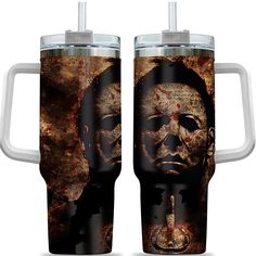 two travel mugs with the same image on them