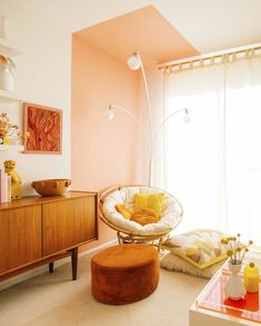 a living room filled with furniture and decor