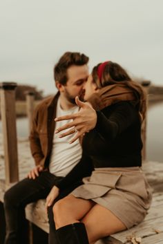 Engagement Session Fall Vibe Moody Engagement photo ideas, engagement ring, matching couples outfit ideas, tan outfits, black and tan, maroon, lake photo session ideas, engagement session photo ideas, columbus ohio wedding photographer, couples pose ideas Tan Outfits, Matching Couple Outfit, Tan Outfit, Photoshoot Ideas Engagement, Couples Outfit Ideas, Blurry Photos, Engagement Session Posing, Couples Pose, Couple Outfit Ideas