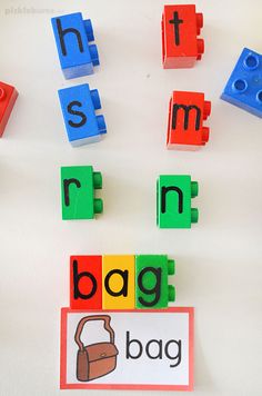 the letters are made out of legos and magnets to spell them in different colors