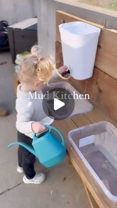 Addison Cluff on Instagram: "Remember how I showed in my stories last week a project we were working on? 🫢👏🏼 well…we made the kids a mud kitchen for outside & I love it!!   Grace absolutely LOVES playing with water & creating “mixers” plus she would live outside if she could, so I knew we needed this! Best part about it is we barely spent anything on this because all the wood was leftover from Sam’s jobs 👏🏼   It’s such a fun thing to watch her use her imagination!   #diy #outdoors #mudkitchen #sahm #homemade #homemaker #homesteader" Kids Mud Kitchen Ideas, Mud Kitchen With Water Dispenser, Kids Outdoor Kitchen Diy, Diy Outside Play, Mud Kitchen With Water Pump, Diy Mud Kitchen For Kids, Diy Outdoor Mud Kitchen, Outdoor Kitchen For Kids Diy, Diy Water Wall For Kids