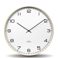 a white clock with black hands and numbers on the face is shown in front of a white background