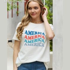 America Wave Graphic 100% Cotton Short-Sleeve Tee Shirt This Patriotic Americana-Style Classic T-Shirt Is Ideal For The All-American Woman With Style ! Solid White Top With Red And Blue America Wavy Graphic In Large Print On The Front. Short-Sleeve Breathable 100% Premium Cotton Shirt. Comfortable, Lightweight, Slightly Stretchy. Pair With Jeans, Shorts, Or Leggings. Perfect Patriotic Top For Election Season - No Matter If You Represent The Republican Or Democrat Party. Details: Color: White, Re Wave Graphic, Love America, Usa Tee, Americana Style, Graphic Style, Americana Fashion, American Woman, Graphic Apparel, Graphic Tops