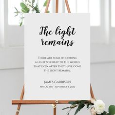 an easel with a sign that says the light remains