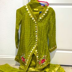 In Good Condition. From Ansab Jahangir Mommy And Me Eid Collection. Size Small. I Also Have A Mini Version In Size 3t Posted. Measurements 16 Inches From The V Neck To The Bottom Opening. And 32 Inches From Top To The Bottom Corner Cut The Back Is 34 Inches Long Pakistani Eid Outfits, Ansab Jahangir, Eid Outfit, Eid Collection, Mommy And Me, Lime Green, 3 Piece, V Neck, Womens Dresses