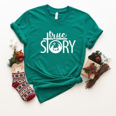 True story shirt, True story Christmas shirt, True story nativity shirt, Christmas Nativity Shirt, Jesus Christmas Shirt, Nativity Shirt M A T E R I A L S → All our simple color ones like White and Black are 100% Cotton. → All our Heathered Colors are cotton/polyester blend and they are super comfy soft! → Bella-Canvas Unisex Jersey Short Sleeve Crew-Neck Unisex T-Shirt → Soft and High-Quality Fabric → Sueded Jersey → Pre-shrunk → Taped shoulder-to-shoulder → Tear away label → Side Seamed → Retail fit S I Z E → We have size chart on our listing photos. S H I P P I N G & P R O D U C T I O N T I M E → Production time is 1-3 business days (depending on proof approval). → Shipping Time is 1-5 Business Days. → If you are in a RUSH, Please contact us. C A R E I N S T RU C T I O N → Inside out, w Gangsta Wrapper Shirt, New Years Shirts, Fresh Christmas Trees, Christmas Tree Shirt, Santa Shirts, Winter Shirts, Xmas Shirts, Comfy Shirts, Tree Shirt