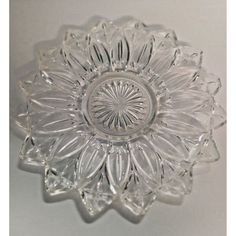 a clear glass plate with an intricate design