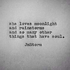 an old typewriter with the quote she loves moonlight and rainstorms and so many other things that have soul