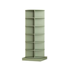 a tall green shelf with many shelves on it