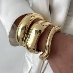 Gold Chunky Cuff Bracelet, Wide Cuff Bracelet, Gold Bangles, Chunky Cuff Bangle, Statement Bracelet, Gift for Her Introducing our Gold Chunky Cuff Bracelets designed with your comfort and style in mind.  3 styles a available  * Thin - for the thinnest style. * Thick - for the medium style. * Extra Thick - for the thickest style. 1 bracelet included in your purchase  1.Thin Bracelet (Cuff) *Width: 1.2 cm *Size: 6 cm *Weight: 60.4 g 2.Thick Bracelet (Bangle) *Width: 2.72 cm *Size: 6 cm *Weight: 56 Thick Gold Bracelet For Women, Gold Bangle Stack, Gold Stacked Bracelets, Thick Bracelets, Gift Collage, Chunky Cuff Bracelet, Vacation Jewelry, Arm Cuffs, Metallic Jeans