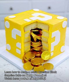 a cake made to look like a yellow block with coins in it and the words learn how to make a mario question block