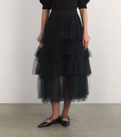 Find SIMONE ROCHA Tulle Tutu Maxi Skirt on Editorialist. Perhaps the most prolific costumery of ballet, the tutu is renowned for its ornate romanticism and floaty disposition - something thats achieved by masterfully layering tulle. Simone Rocha, inspired by the English National Ballet for Spring/Summer 2024, takes the piece to off-stage realms, with this maxi skirt encapsulating the drama and softness of the dance in a wearable length to style with your favourite tee. Simone Rocha Skirt, Elegant Tulle Skirt For Cocktail, Elegant Black Tulle Petticoat, Elegant Tulle Skirt With Ruffles, Elegant Tulle Dress For Dance, Elegant Tulle Petticoat With Ruffles, Elegant Evening Tulle Petticoat, Elegant Tulle Petticoat For Evening, Formal Fitted Tulle Skirt