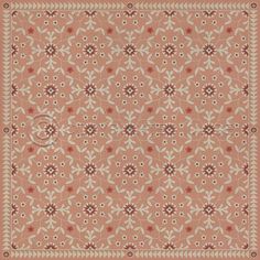 an orange and white rug with floral designs on the bottom, in shades of brown