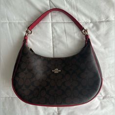 Coach Brown Red Cherry Red Signature Classic Logo Shoulder Purse Bag Style: Coach Signature Harley East West Hobo Brown/Red Bag Retails $380 New Measures 13.5” Long, 4” Wide, 9.5” Tall, Inside Is 7.5” Deep, And Strap Is 8.5” Tall Has A Small Zippered Pocket On The Back 2 Front Inside Pockets And 1 Zippered Pocket On The Inside Back Some Cosmetic Stains Inside But Nothing Crazy Great Condition Perfect For The Fall Red Shoulder Bag, Red Bag, Style Coach, Red Cherry, Classic Logo, Bag Style, East West, Purse Bag, Women Accessories Bags