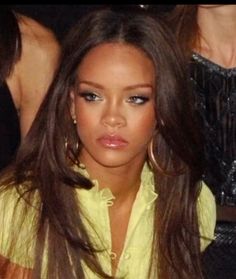 a close up of a person with long hair