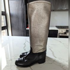 Chanel Leather Knee-High Riding Boots Black And Silver Size 38.5 Used Condition, See Pictures. Creasing At Toe, Wear To Soles, Small Mark On Leather Interlocking Cc Logo Round-Toes Block Heels From The 12a Collection Details Estimated Item Measurements Circumference: 14.25" Calf Circumference: 14.25" Shaft: 16.25" Heels: 1.25" Platforms: 0.25" Chanel Runway, Black Riding Boots, Round Logo, Silver Logo, Cc Logo, Chanel Shoes, Black And Silver, Boots Black, Riding Boots