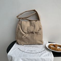 43113253208111 School Bucket Canvas Bag, Canvas Baguette Shoulder Bag For Daily Use, Large Capacity Tote Baguette Bag For Travel, Daily Use Bucket Shoulder Bag With Pockets, Summer Canvas Backpack Shoulder Bag, Beige Bucket Canvas Bag For School, Brown Shoulder Bag For School In Summer, Brown Summer Shoulder Bag For School, Brown Shoulder Bag For School Summer Season