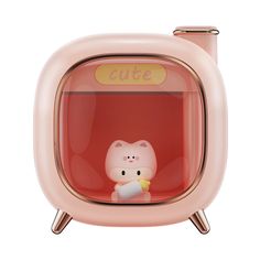 a pink hello kitty alarm clock sitting on top of a table