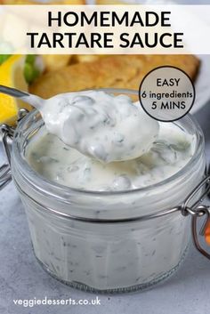 homemade tartare sauce in a glass jar with a spoon on the side and text overlay