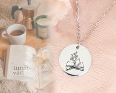 Reader themed stainless steel charm necklace.  This jewelry is the perfect personalized gift for a friend or family member who loves to read- an English teacher, librarian, and bookworm.   For that special touch, add a name or short message to the to express your heartfelt sentiment and let them know how much you love and support them.  Also, the pendant makes a great birthday, Christmas, graduation, or retirement gift.  The pendant necklace is handmade and the charm is laser engraved.   DETAILS Gift For Librarian, Book Charm, Book Pendant, Teacher Librarian, Gifts For Librarians, Short Message, Gifts For Bookworms, Retirement Gift, English Teacher