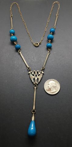 "Unique! Antique Art Deco piece blue Czech bead lariat necklace never seen one like it the measures 22\" long and hangs down 3.75\" pendant in very good condition." Blue Lariat Necklace For Gift, Blue Lariat Jewelry With Adjustable Chain, Blue Long Drop Necklace As A Gift, Blue Long Drop Necklace For Gift, Blue Long Drop Necklace As Gift, Blue Lariat Necklace With Adjustable Chain, Blue Long Lariat Necklace With Adjustable Chain, Blue Lariat Necklace As A Gift, Blue Art Deco Necklace For Formal Occasions