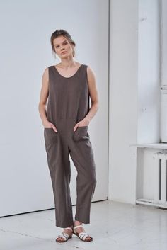 MsWrinkle’s clothing – from human to human.  100% handmade.*Description*- Free fit linen cross back jumpsuit with pockets on front.- High quality European linen;- Washed and softened (doesn't shrink anymore);- Medium weight linen (150 g/m2);- Our linen is OEKO-TEX certified that meets human ecological safety requirements;- Model is wearing size S in greyish brown and honey yellow (other sizes and colours please choose on the right);- Not transparent;- Not ironed and we suggest to use tumble drye Relaxed Fit Linen Overalls With Pockets, Linen Overall Jumpsuit With Pockets, Linen Overall Jumpsuits And Rompers With Pockets, Linen Overalls With Pockets, Sleeveless Overalls With Side Pockets In Relaxed Fit, Sleeveless Linen Overalls With Pockets, Sleeveless Linen Overalls, Long Linen Shirt, Linen Slip Dress