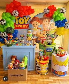 toy story themed birthday party with balloons and toys