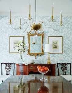 a dining room table with fruit on it