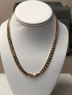 METAL: 14kt Solid Yellow Gold LENGTH: 18 inches WIDTH: 7mm WEIGHT: 61.3 grams MADE IN ITALY This very well made Miami Cuban Solid Link Necklace has all solid links, flexible, comfortable to wear, finished with end caps and a large secure lobster claw clasp closure. FREE SHIPPING Regular Retail Price: $9,989.00 14k Gold Cuban Link Necklace With Polished Finish, Yellow Gold Polished Cuban Link Necklace, Yellow Gold Cuban Link Necklace With Polished Finish, Classic Cuban Link Necklace With Curb Chain For Anniversary, Classic Gold Cuban Link Necklace For Anniversary, Formal 14k Stamped Cuban Link Necklace, Formal Gold Cuban Link Necklace In 14k Gold, 14k Gold Cuban Link Necklace Stamped 14k, Italian Horn