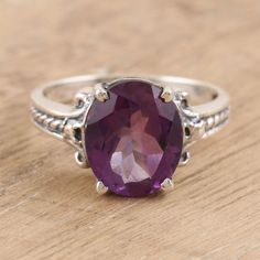 With its shimmering purple gemstone, there's lots to love about Chintan's cocktail ring. Indian artisans center the ring with a faceted amethyst in a decorative prong setting, while a slim sterling silver band shines with an oxidized rope motif. Formal Hallmarked Sterling Silver Amethyst Ring, Formal Amethyst Ring In Sterling Silver, Vs Clarity, Luxury Formal Amethyst Ring, Oval Cabochon, Elegant Silver Amethyst Ring, Oval Cabochon, Nickel-free Silver Amethyst Ring In Sterling Silver, Amethyst Cocktail Ring, Ring Indian, Silver Cocktail, Sterling Silver Bands